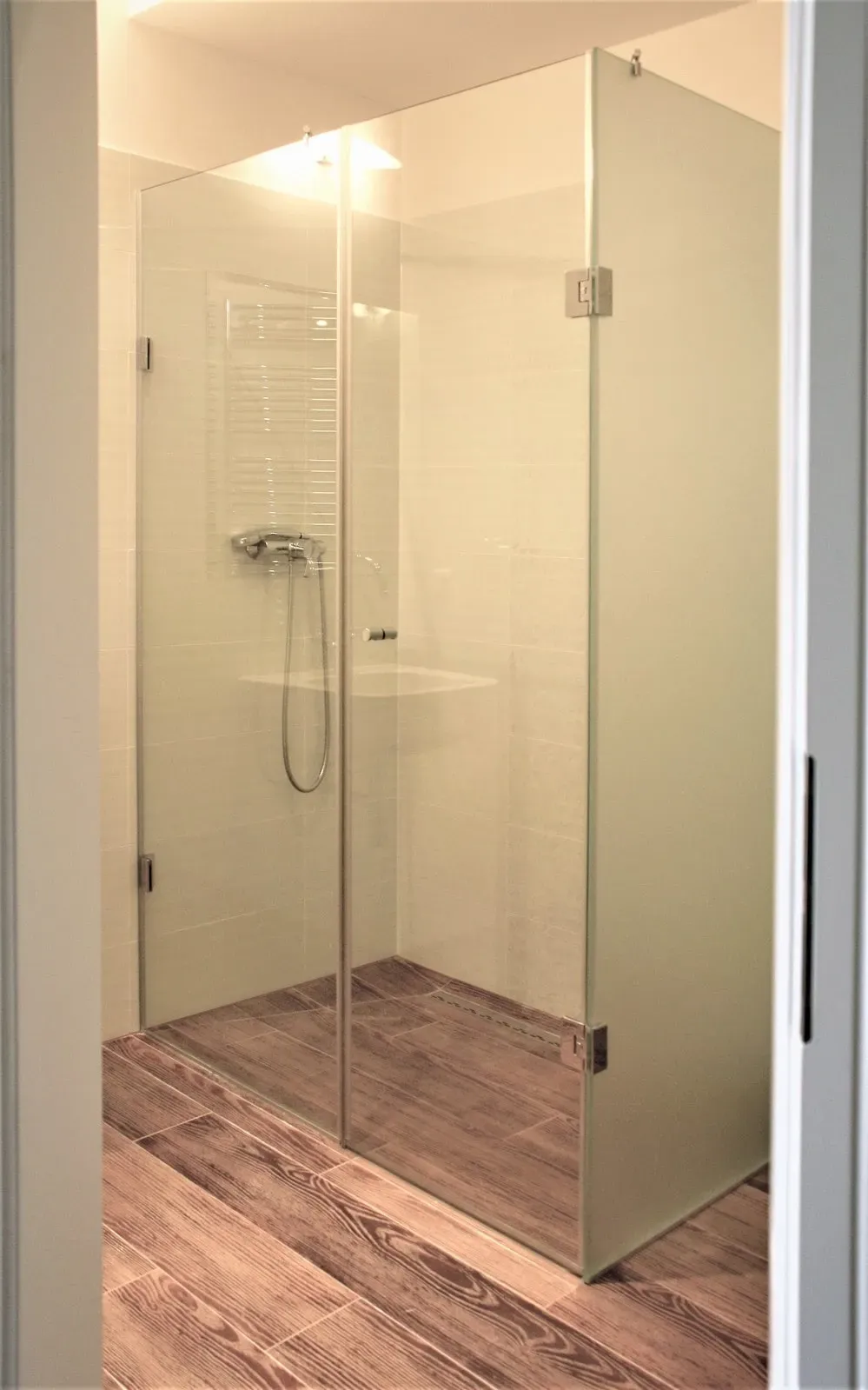 Shower enclosures and screens
